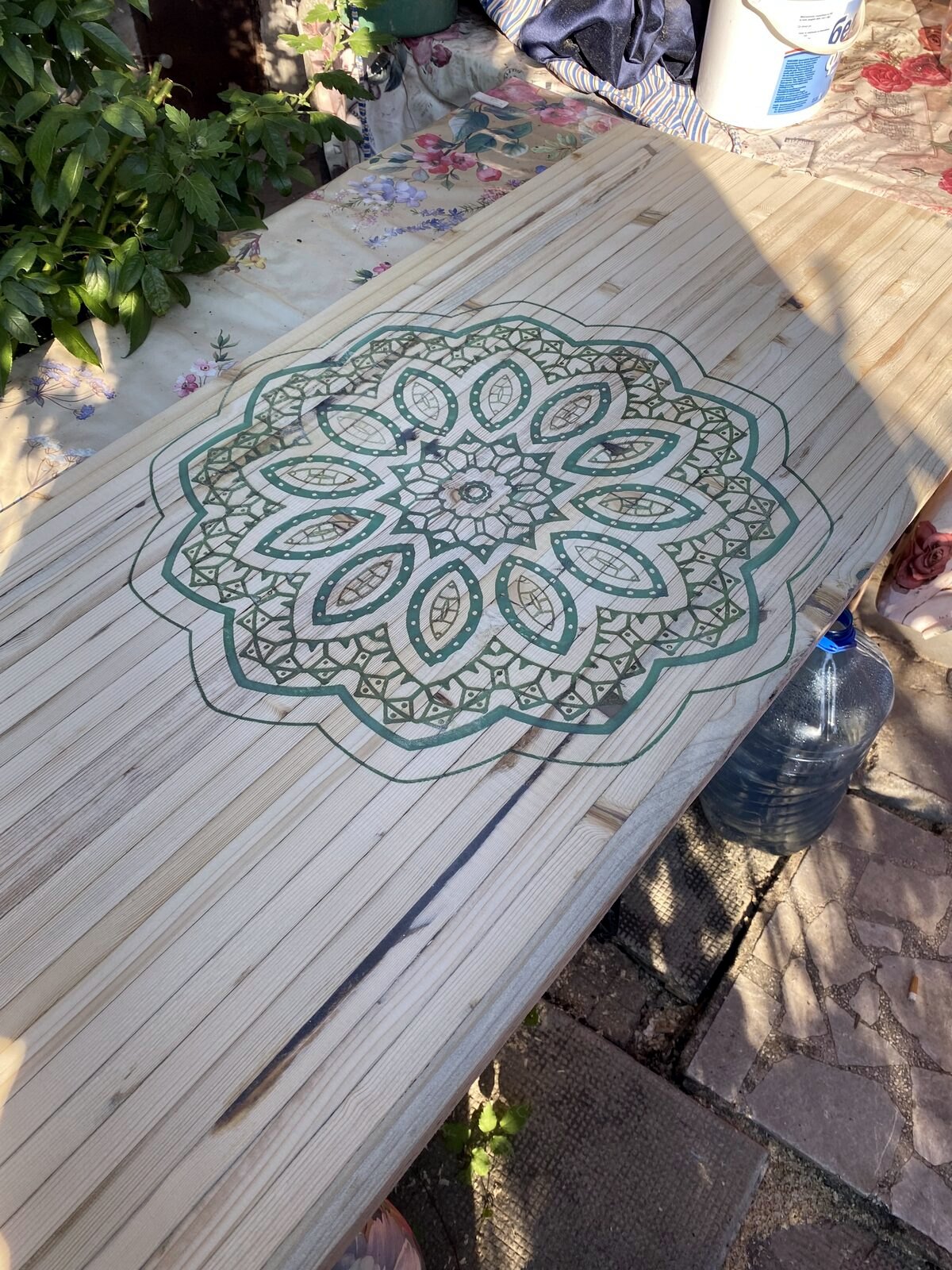 Carving detail of a circular mandala dining table top
