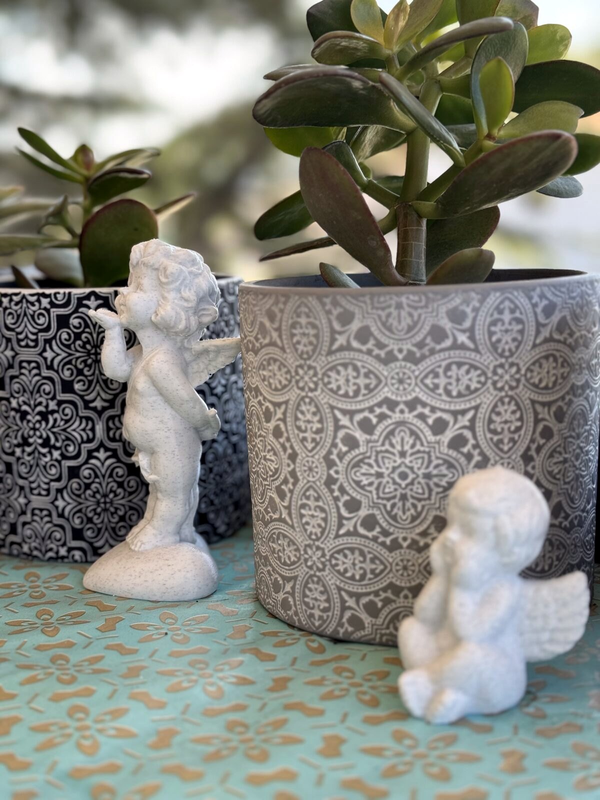 Cute small 3D printed human-like planter pots with plants