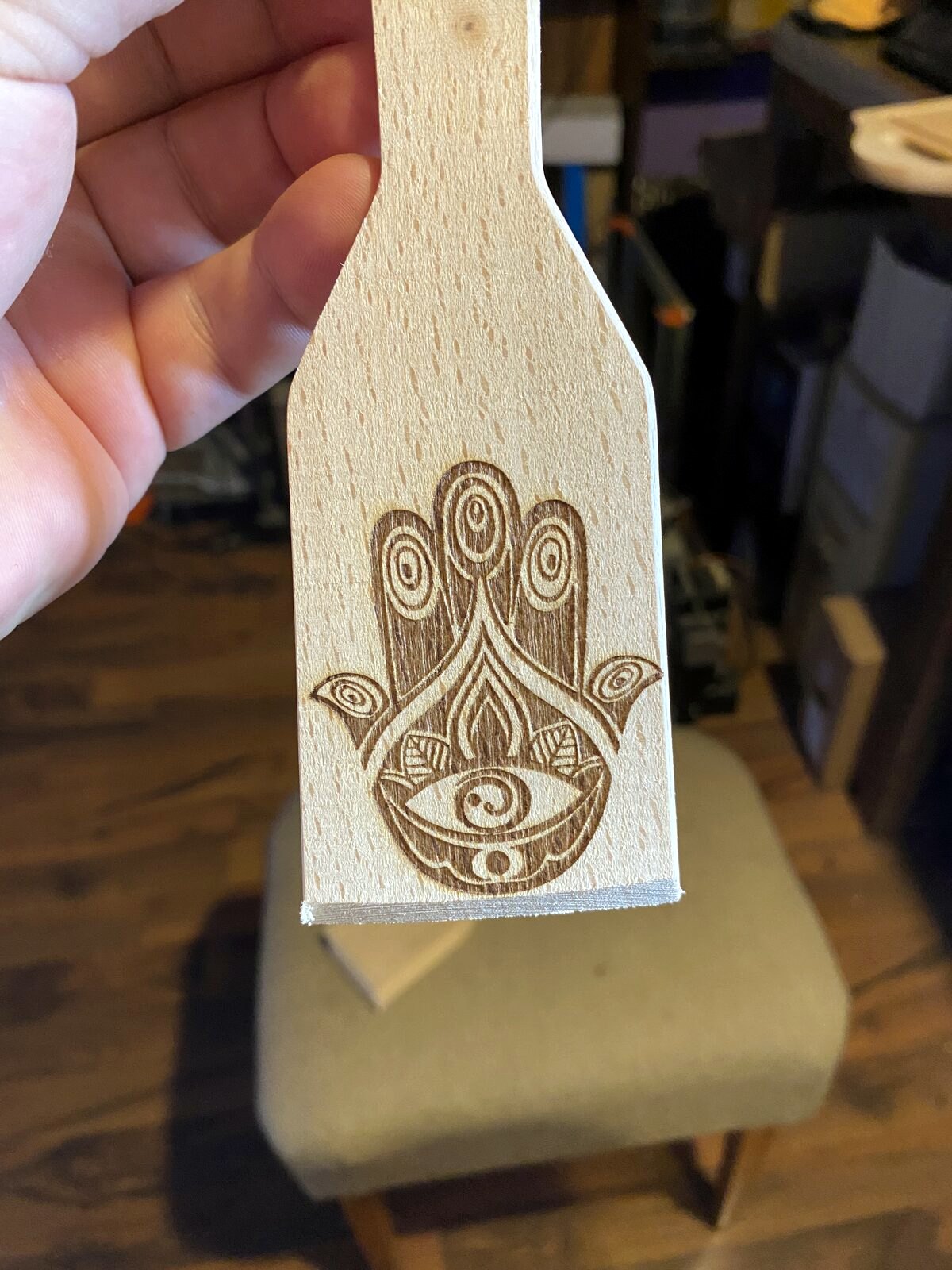 Laser engraved wooden keychain with Hamsa hand motif